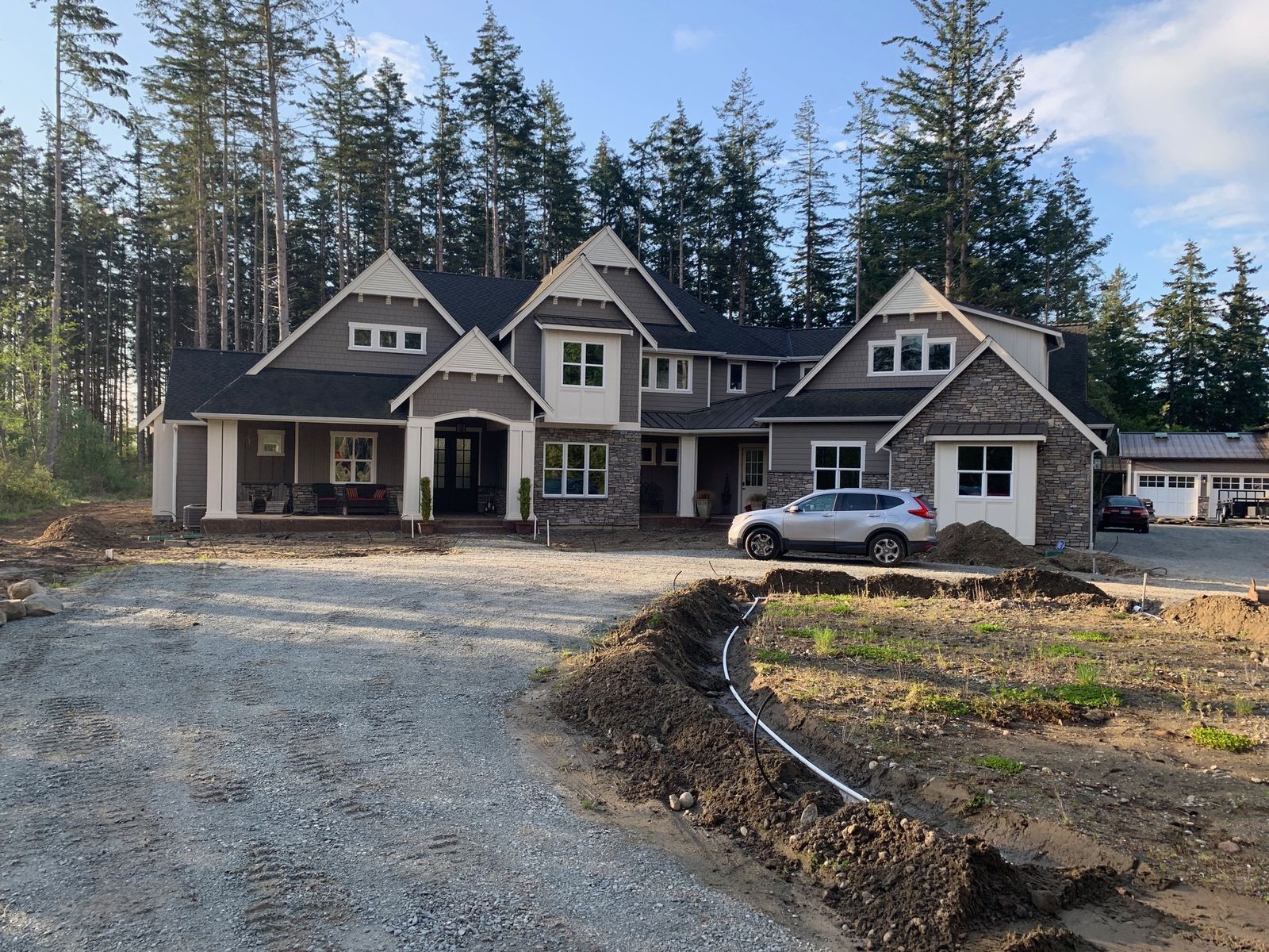 expensive home on property needing landscaping before Salazar's All Seasons landscaping's work.