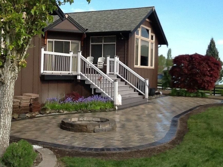 paved patio and paver fire pit