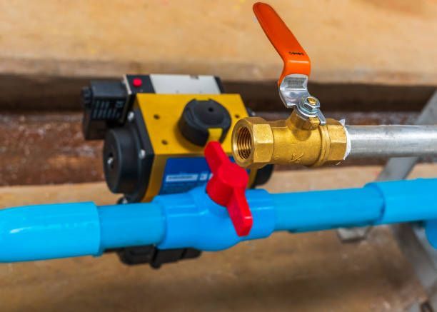 A close up of a valve on a blue pipe Northglenn, Colorado accountable home services