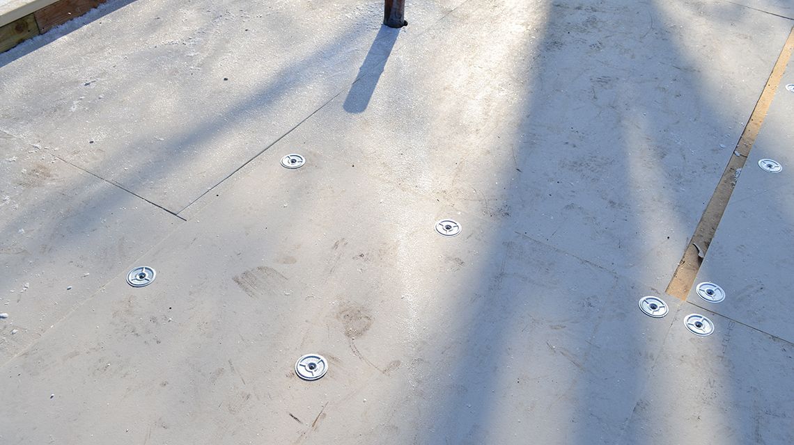 light gray surface with metal fixtures