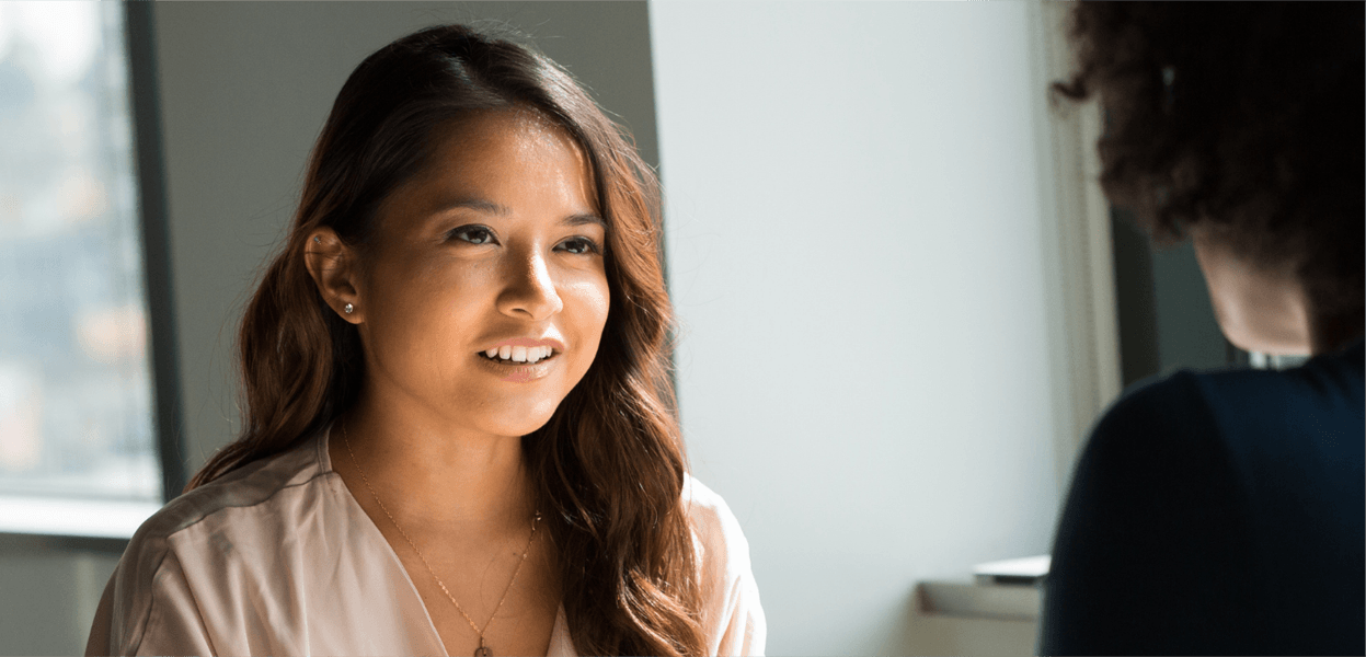 young woman having a conversation with life coach