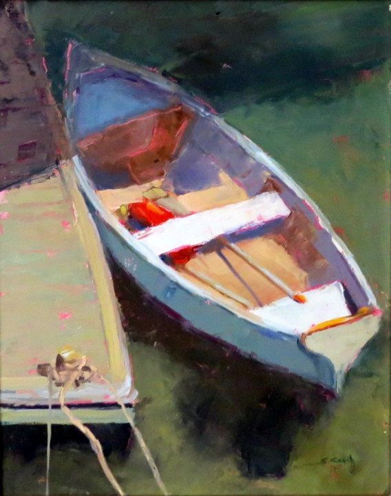 Small rowboat tied to a dock on green water, painted in white, blue, and red.