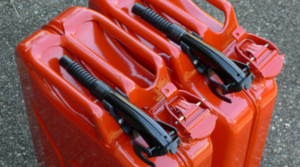 Picture of two red jerry cans for fuel.