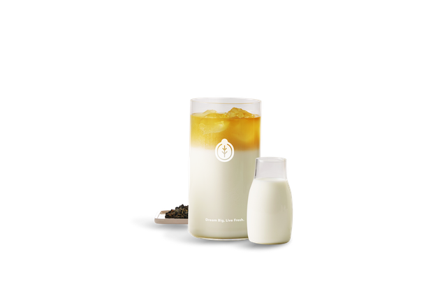 Fresh milk accompanies Taiwan's signature premium 33 King's Oolong Fresh Milk Tea served over ice.