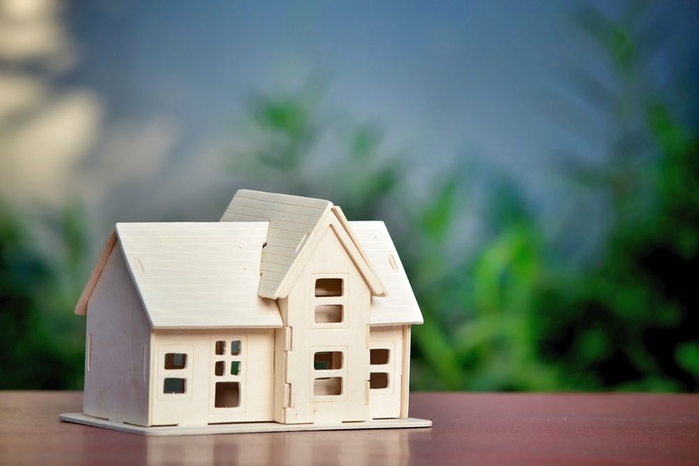 Miniature White House Model on A Wooden Surface — Rauseo Group in Zuccoli, NT