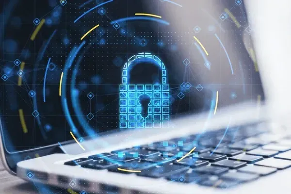 A laptop computer with a padlock on the screen.