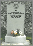 A tall sanded stone with a deep carved celtic knott. 