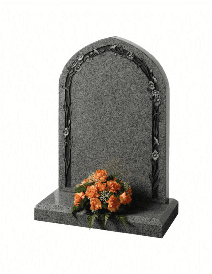 A fresh interpretation of the traditional gothic shape, your chosen inscription is framed within a delicate floral arbour. Shown here in Karin Grey granite.