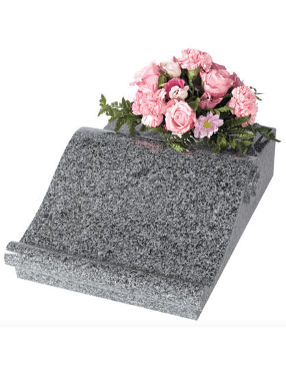 Scroll desk tablet with vase.