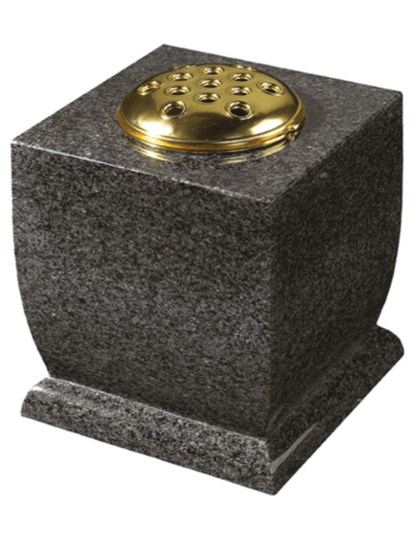 A shaped vase cut onto a moulded plinth.