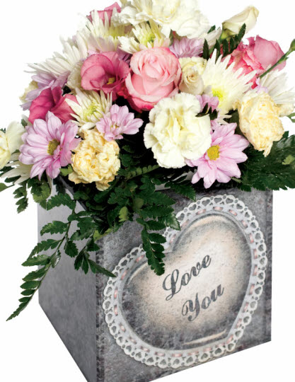 A small vase further enhanced with this delicate cushioned heartdesign on Lavender Blue Granite.