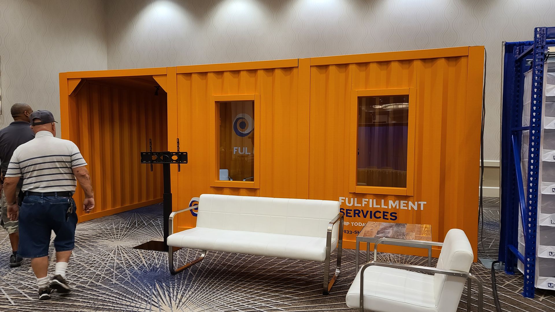GOKARTON's Custom Cardboard Shipping Container Booth. Immersive Trade Show Meeting Space.