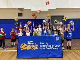 Aussie Hoops program in action throwing balls.