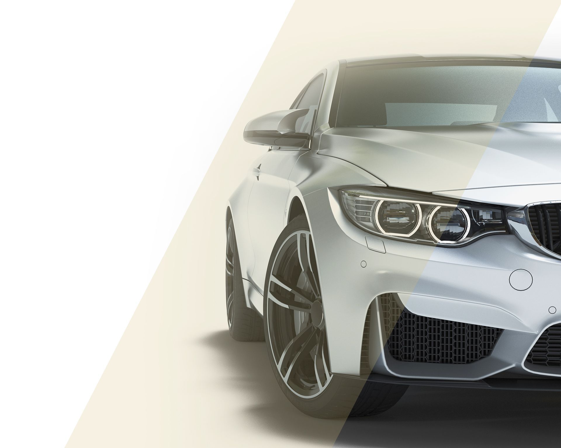 A close up of a white car on a white background