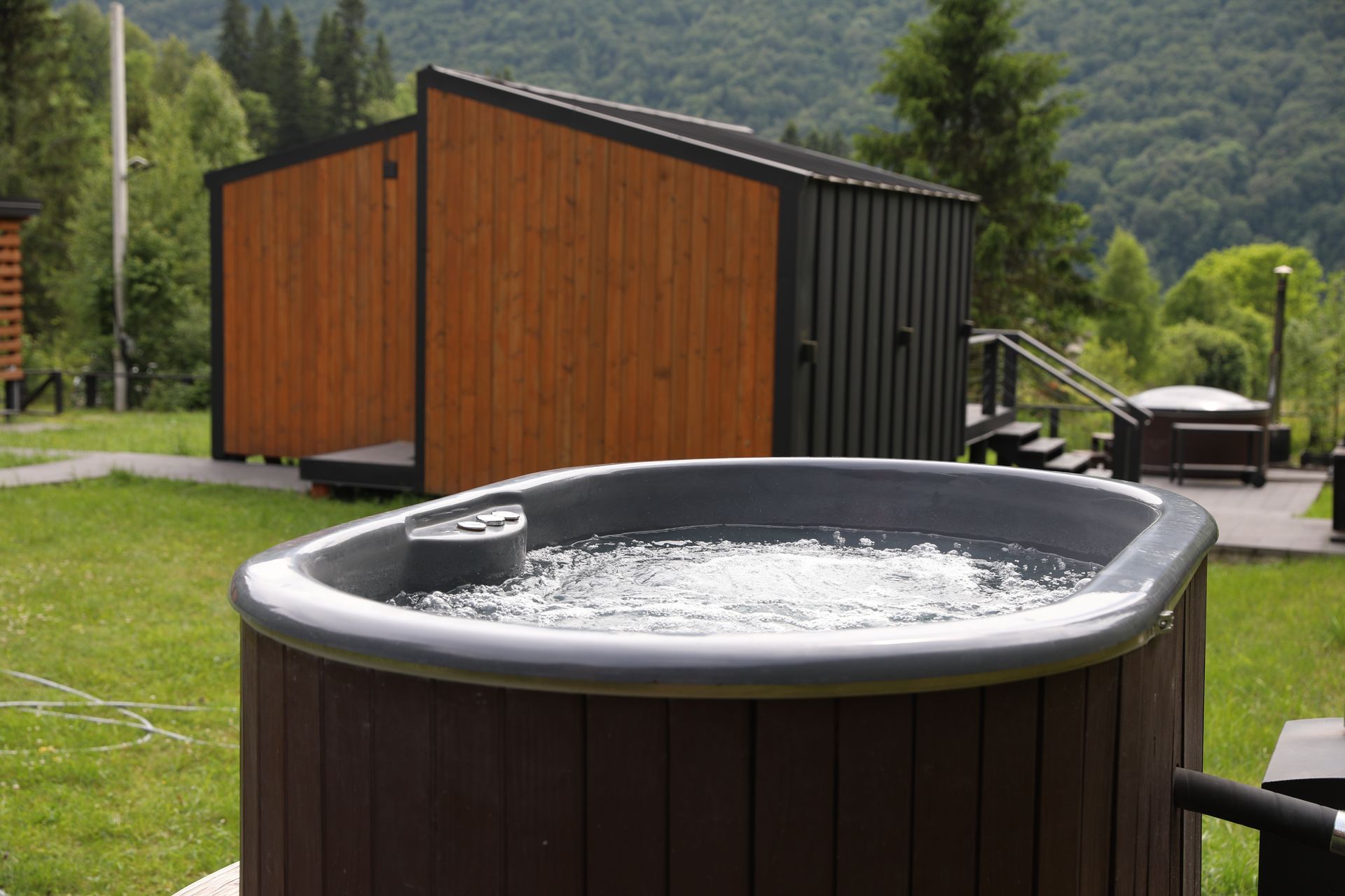 White spa hot tub with multiple jets and molded seats, shown in a close-up interior view