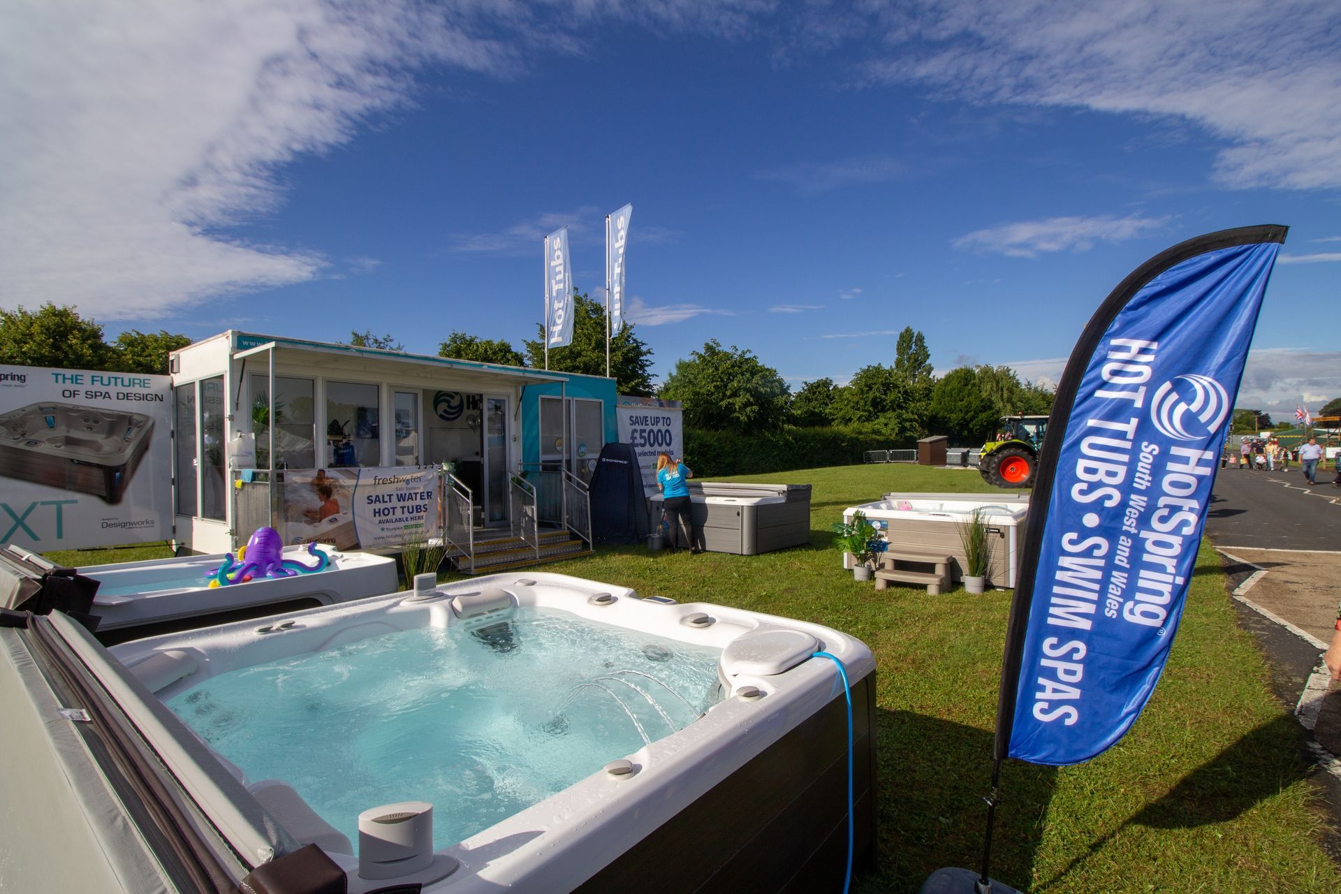 White spa hot tub with multiple jets and molded seats, shown in a close-up interior view