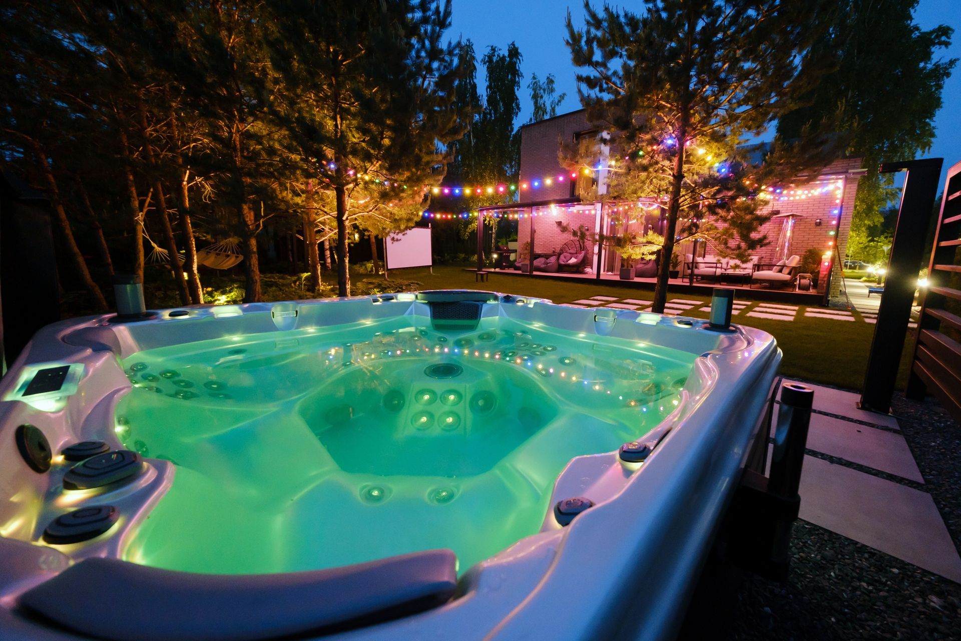 White spa hot tub with multiple jets and molded seats, shown in a close-up interior view
