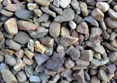 Pile of small gray and brown pebbles covering the frame