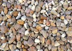 Close-up of a pile of small, multicolored pebbles and gravel.