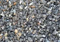 Close-up of small gray and tan gravel stones covering the ground