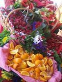 There are many different types of fruits and vegetables on the table.