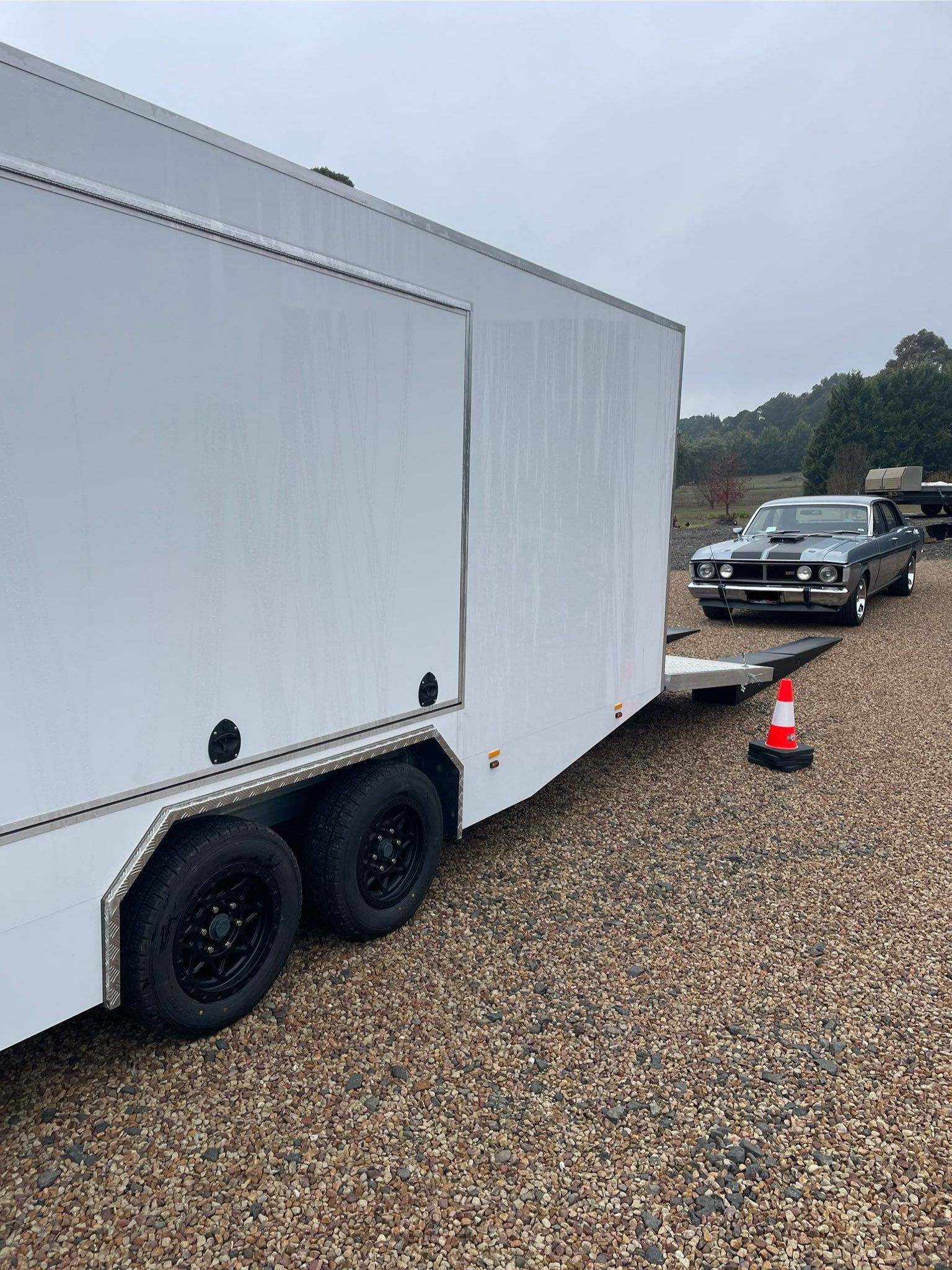White Enclosed Car Trailer with A Classic Grey Car — Full Throttle Enclosed Car Transport in Brisbane, QLD