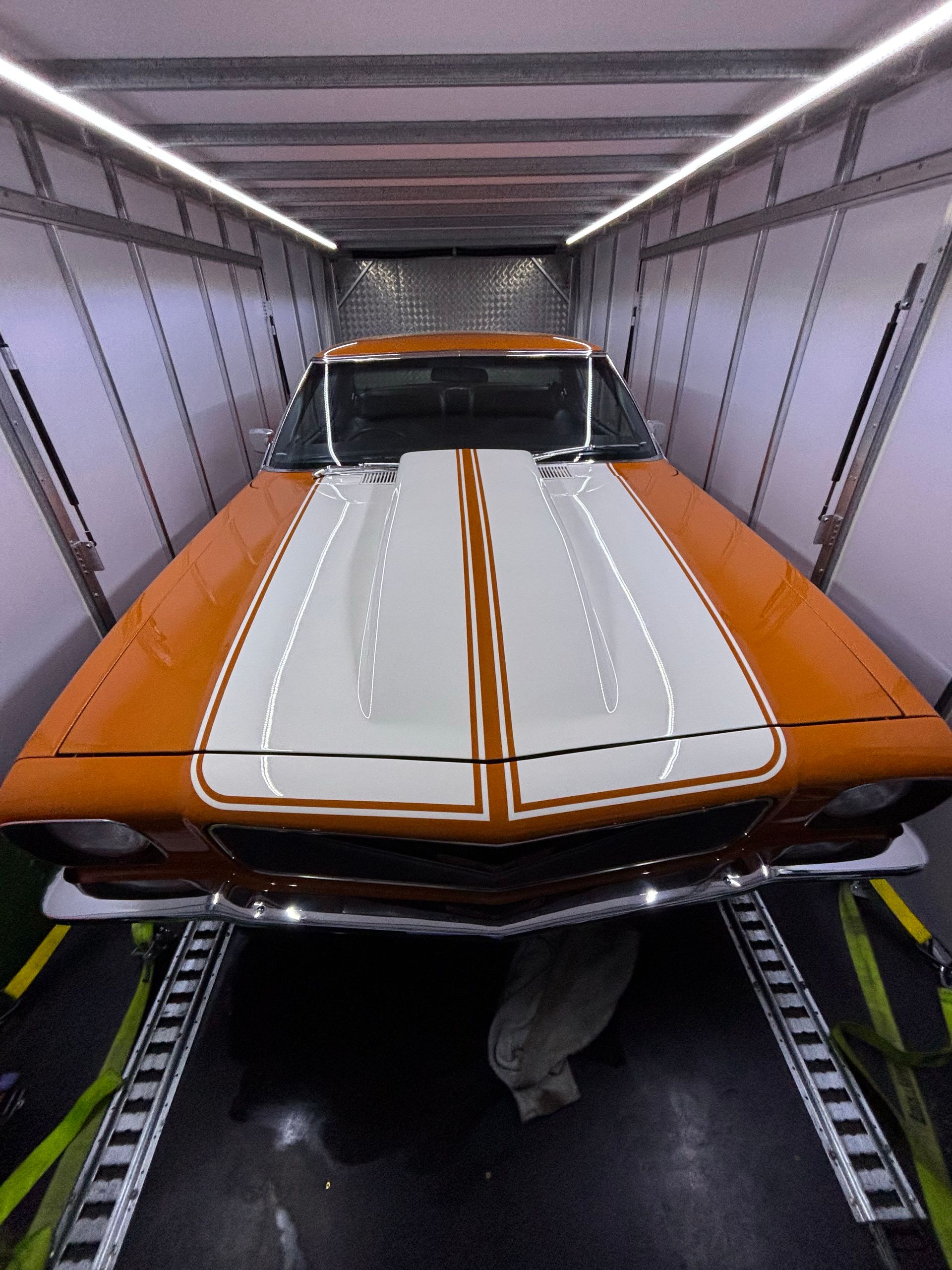 Orange and white classic car secured inside a transport trailer - Full Throttle Enclosed Car Transport in Kilmore, VIC
