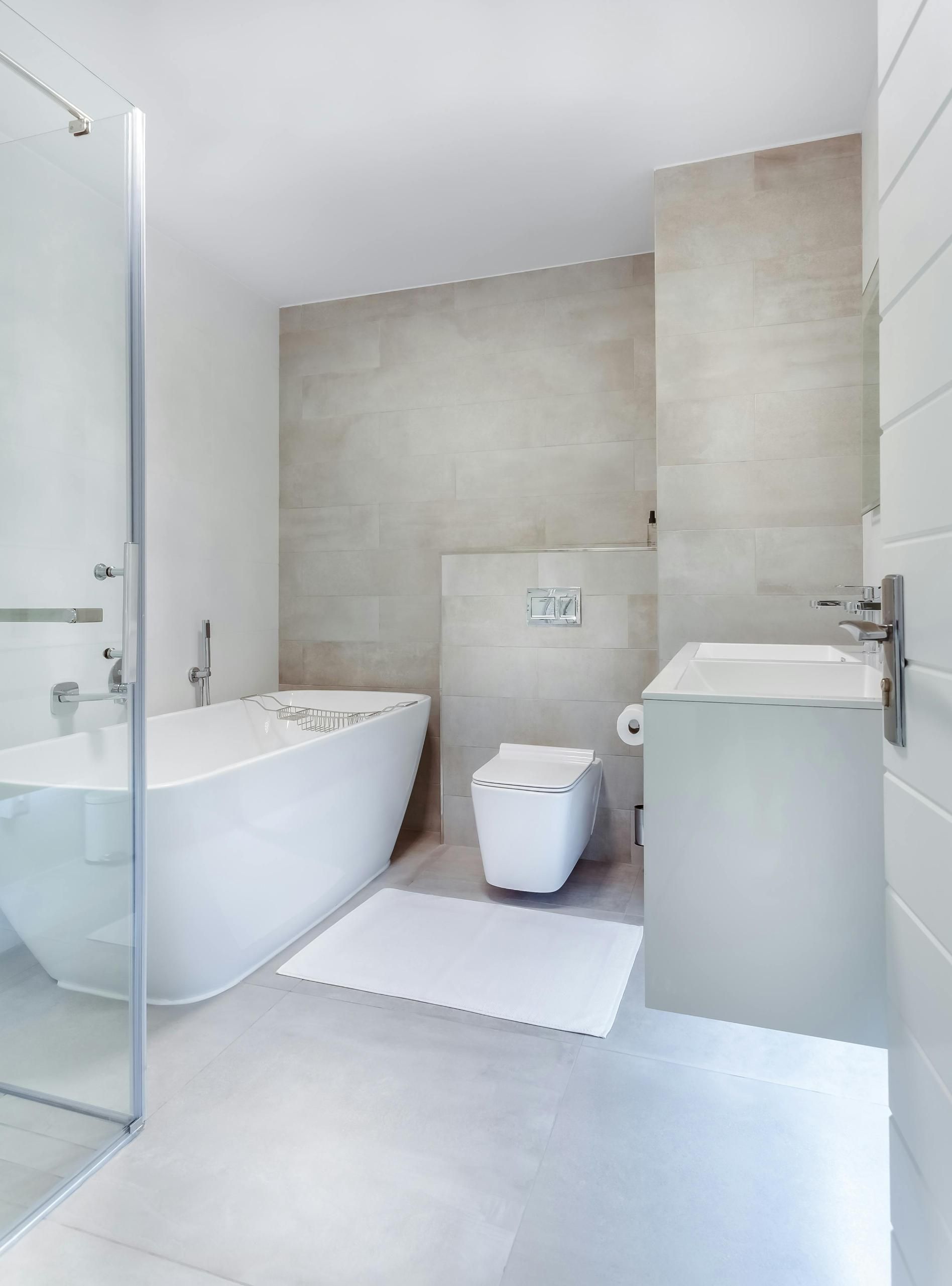 A Bathroom With a Bathtub, Toilet, Sink and Walk in Shower — Edwards Plumbing Pty Ltd in South Murwillumbah, NSW