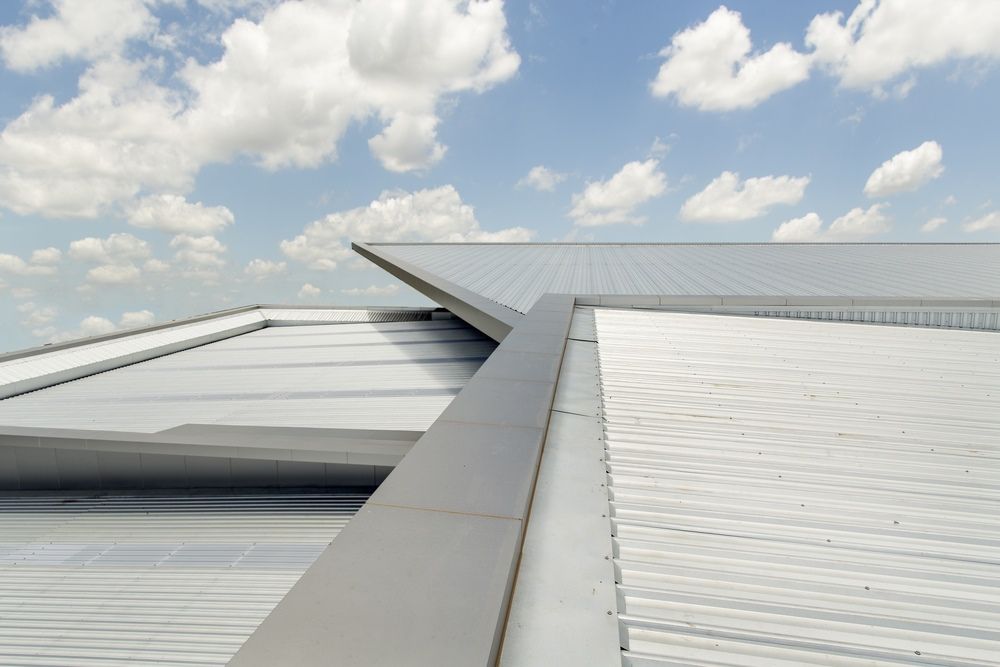 The Roof of A Building with A Blue Sky in The Background — Edwards Plumbing Pty Ltd in Byrrill Creek, NSW