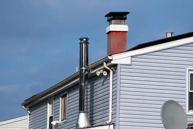 A House With a Chimney on the Side of It — Edwards Plumbing Pty Ltd in Chillingham, NSW