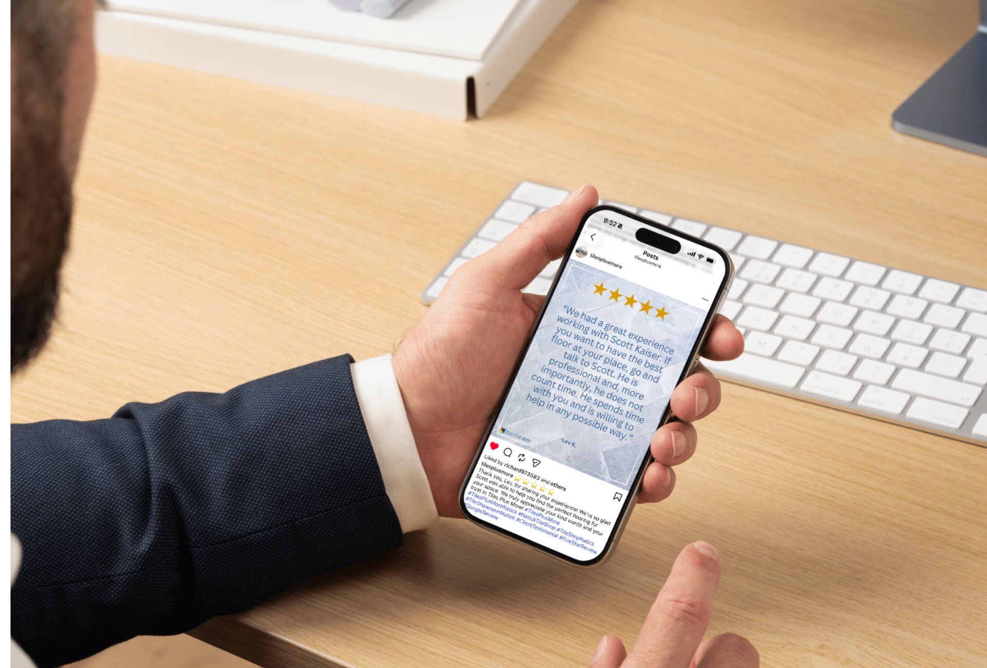 A person holding a smartphone displaying a five-star customer review posted on Instagram.