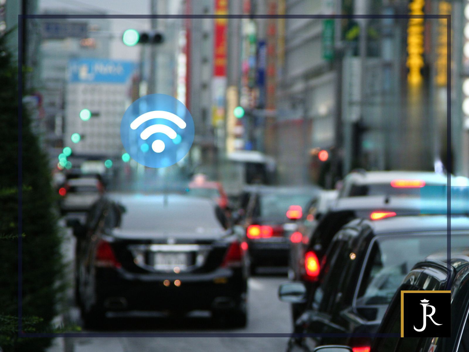 City street traffic with a glowing Wi‑Fi symbol over cars and buildings, suggesting wireless connectivity