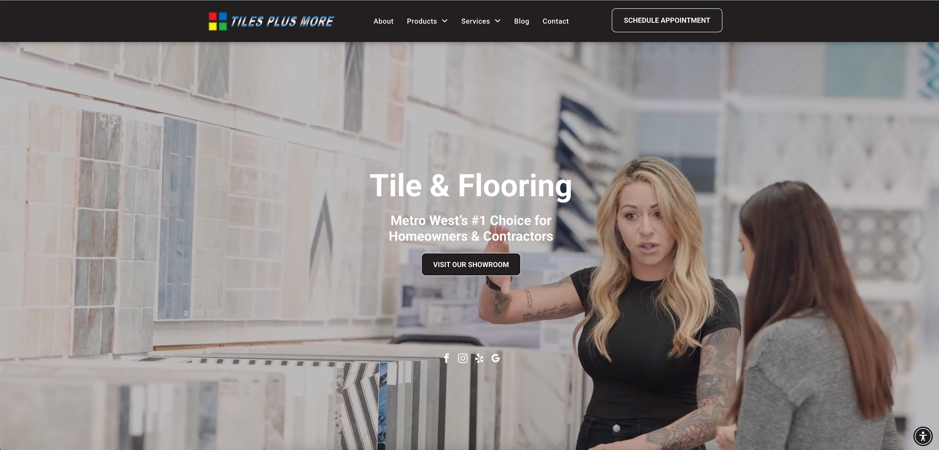Tile and flooring showroom with patterned samples and two people talking in front of a display wall