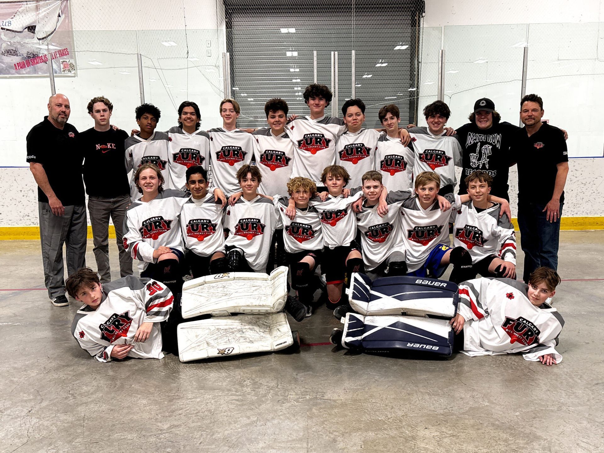 U15A Fury ball hockey team group photo wearing white jerseys