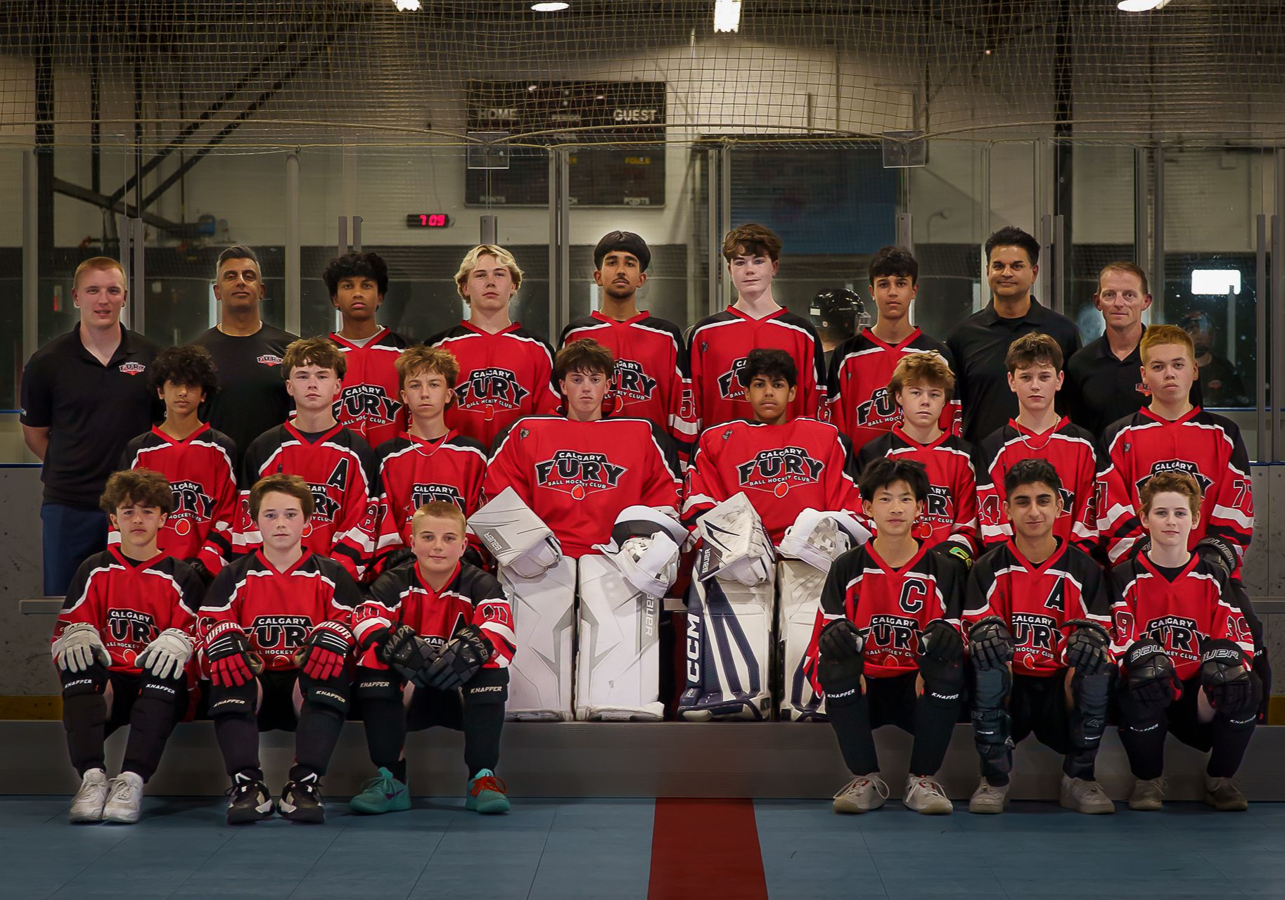 U15A Fury ball hockey team group photo wearing white jerseys