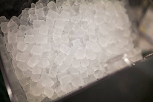 A close-up view of ice cubes in a container.