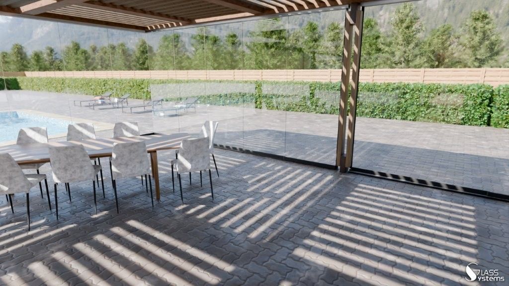 Terrasse extérieure avec tables et chaises blanches sous une pergola, donnant sur un jardin paysager et un chemin de pierre.