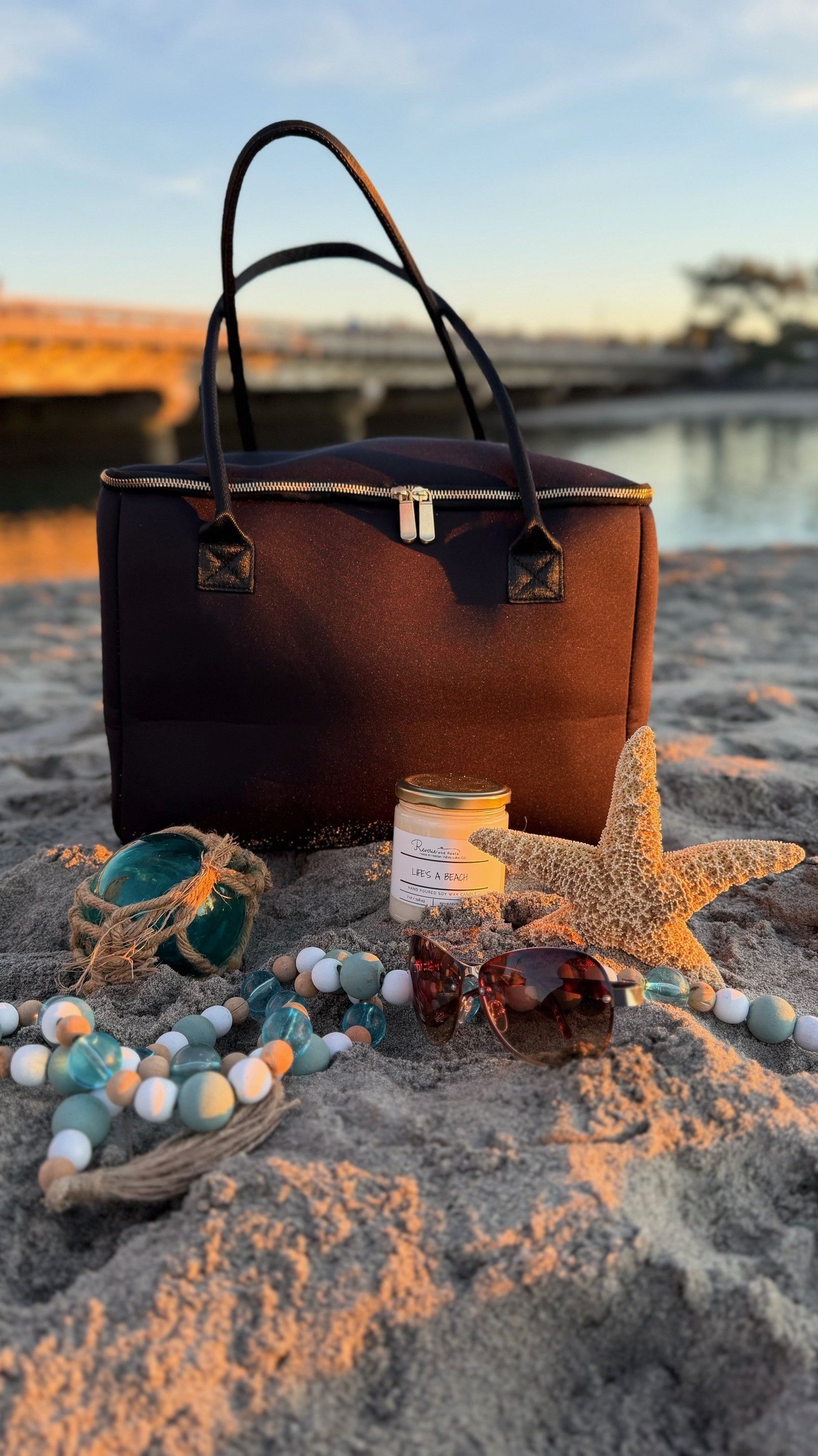 The Birdie insulated tote bag by The Stever Co at Del Mar beach sunset