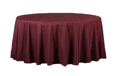 Burgundy round tablecloth covering a table.