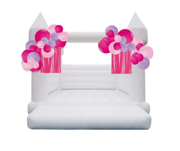 White bounce house decorated with pink and purple balloons.