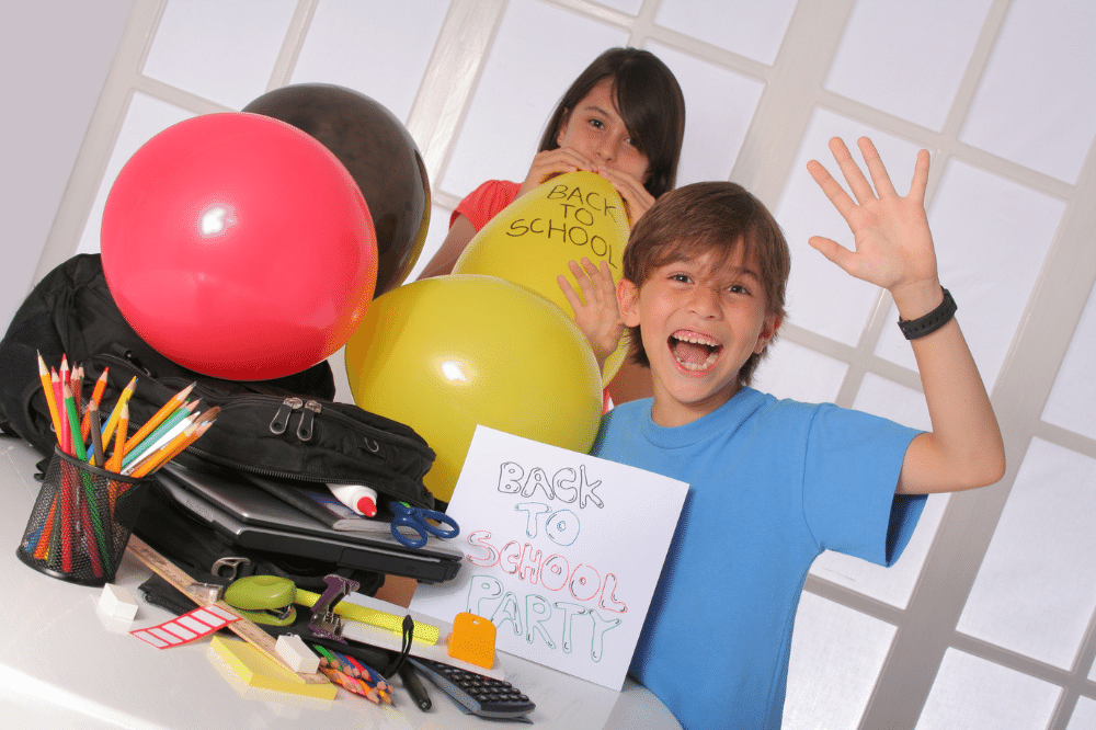 Boy waving excitedly with