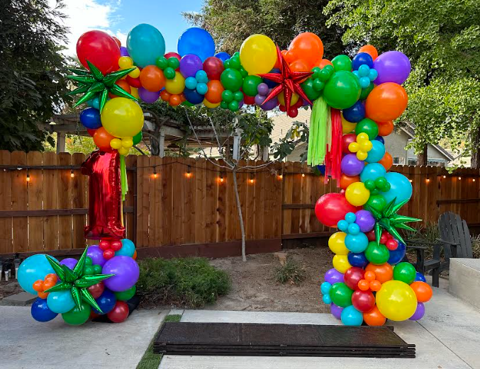 Colorful balloon arch with a large number