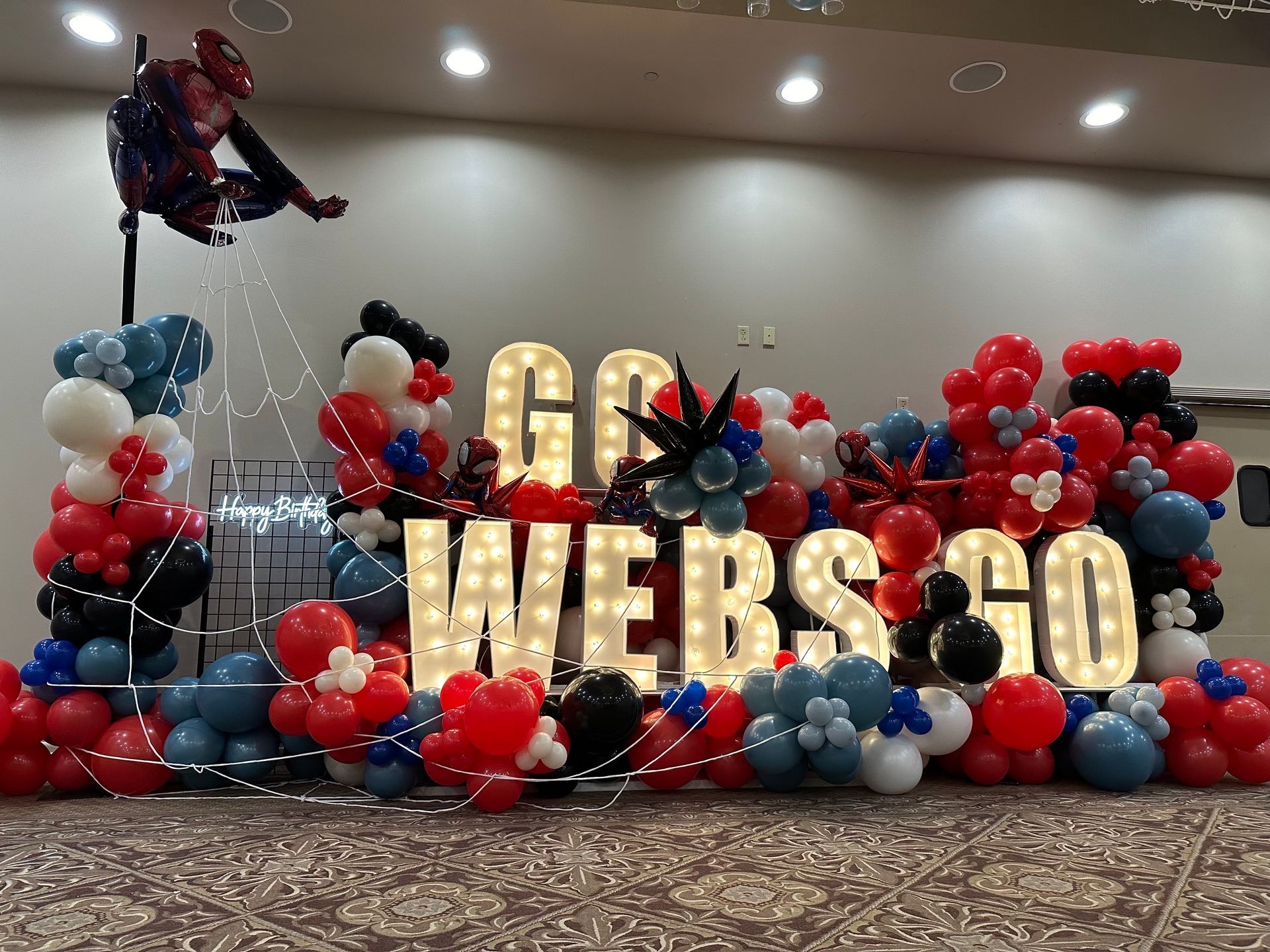 Spider-Man themed balloon display with