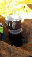 Man Is Lifting A Large Metal Object - Oxford, MS - Precision Engineering Corporation