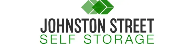 A logo featuring two stacked green cubes above the text