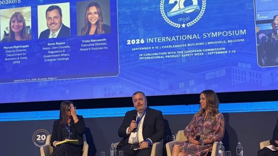 Trista Hamsmith on stage with fellow panelists at the 2026 ICPHSO International Symposium in Brussels, Belgium