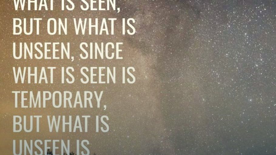 White quote text on a dark starry background, partially cropped.