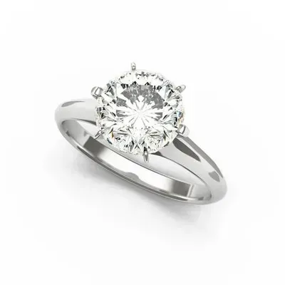 Silver engagement ring with a round-cut diamond on a white background