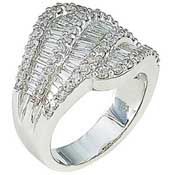 Silver ring with a raised, textured band and decorative diamond-like accents