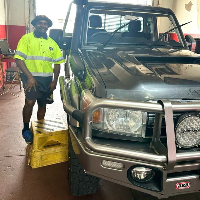 Automobile Special Workers Replacing Windscreen — O'Brien Carglass & Tinting in Tolga, QLD